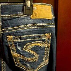 Like new size 29waist 33 length  saluki silver jeans